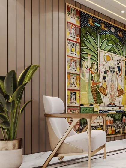 A detail shot of a lounge, where the focus is on the juxtaposition of a modern armchair against a traditional Pichwai artwork. This render highlights cultural richness within a contemporary setting.