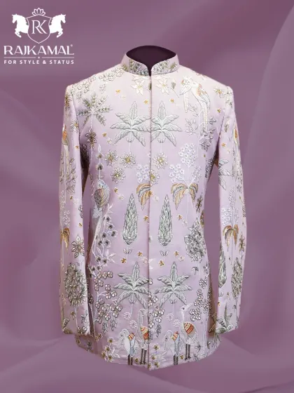 A truly unique Jodhpuri in a soft lilac, featuring exquisite embroidery of birds and foliage. This piece is luxury that speaks for itself.