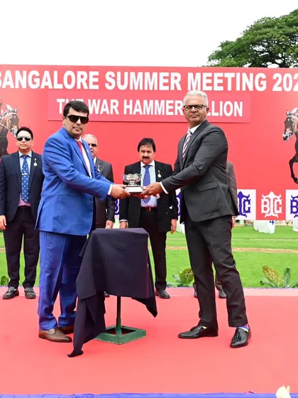 Dr. C. A. Prashanth presents The War Hammer Million trophy to the owners of Circle of Dreams.