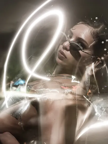 Let's get experimental. This is a creative portrait where I use light painting to sculpt and frame the model, turning a simple shot into a piece of art. This technique is great for album covers or unique editorial features.