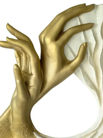 Mudras are the art of speaking without words. The golden hands in this sculpture form a gesture of inner knowing and connection, a silent language of the soul.