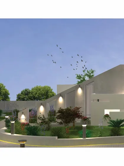 A daytime render of the memorial's landscaped pathway. The lighting fixtures and curated planting guide visitors along a gentle, curving path towards the main building.