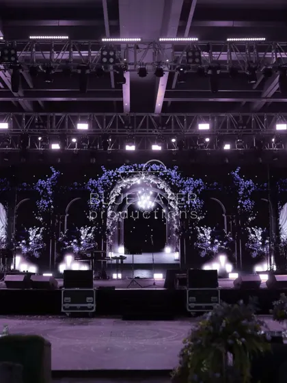 The stage is set for a night of music and celebration. For this Sangeet, we used LED screens with custom graphics to create a dynamic backdrop for the performers.