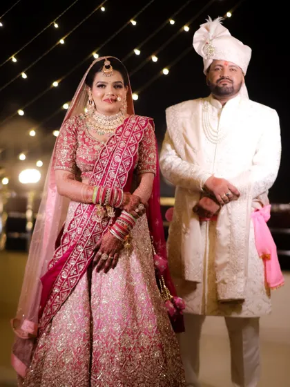 A classic wedding portrait of the bride and groom. The bride's makeup is timeless, ensuring she looks perfect in her wedding album for years to come.