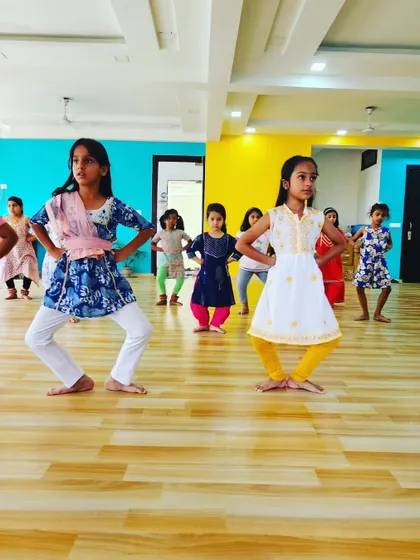 Young students in our Bharatanatyam class practicing their aramandi, the foundational half-sitting posture of the dance form.