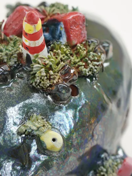 A sneak peek of the composite forms created in our Miniature Workshop. These whimsical pieces, like a whale with a lighthouse on its back, show how combining small elements can create a magical, narrative sculpture.