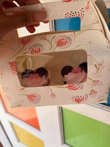 Here are the Minnie Mouse cupcakes packed in a cute floral box, ready for delivery. I offer different packaging options to suit your party or gifting needs.