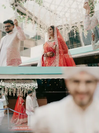 The bride's graceful entrance under a beautifully decorated floral umbrella, a key moment in many Indian weddings.