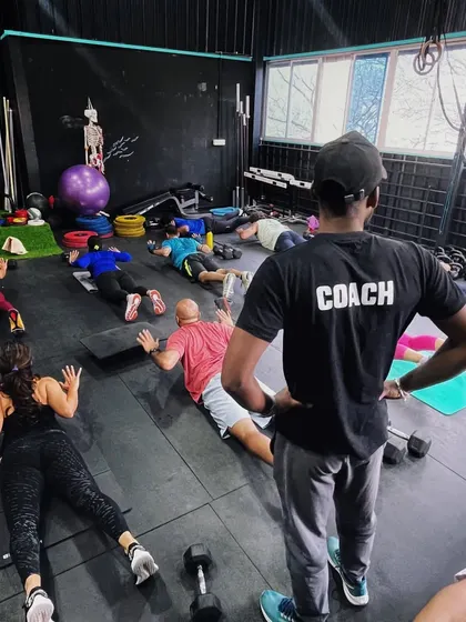 The Superman exercise is a great way to build a strong lower back and core. Here, our coach leads a class through a floor based conditioning circuit.
