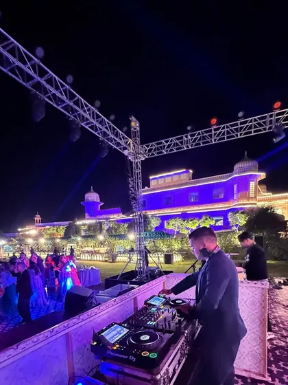 I have the experience to handle grand-scale destination weddings. This was a spectacular outdoor reception at a palace hotel in Jaipur, where the lighting, sound, and music came together for an unforgettable night.