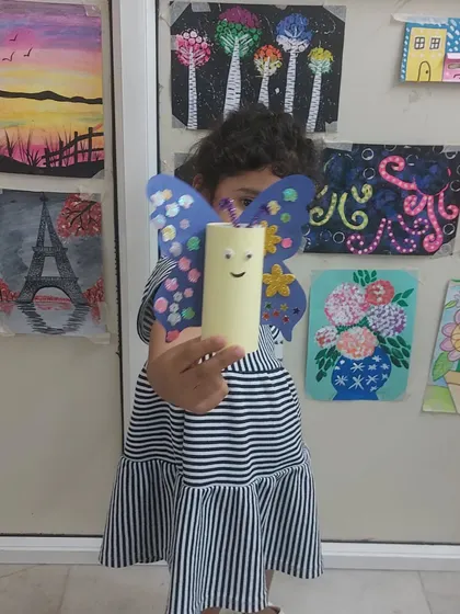 A cute butterfly craft made from a toilet paper roll. We believe in turning everyday waste materials into art.