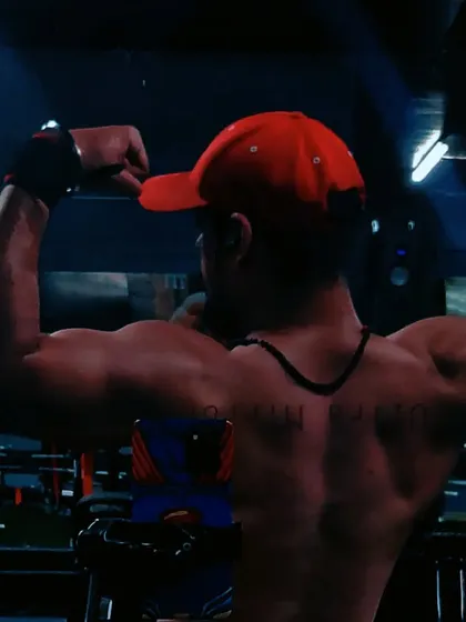 An aesthetic back pose. My coaching emphasizes symmetry and definition across the entire back, from the traps down to the lower lats.