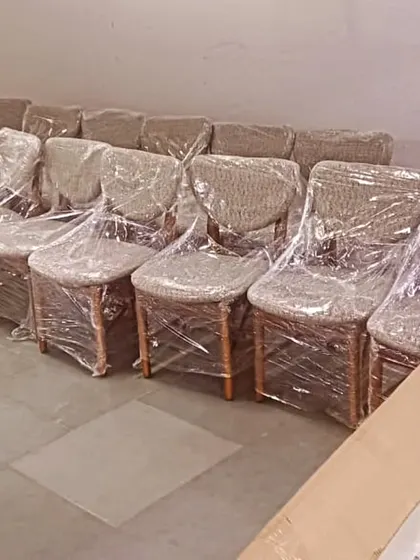 A batch of our dining chairs, wrapped and ready for delivery to a restaurant client in Chembur, Mumbai. We can handle bulk orders for commercial projects.