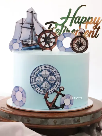 A retirement cake for someone from the Mumbai Port Authority. I designed it with a nautical theme, including an anchor, a ship's wheel, a compass, and the official MPA logo.