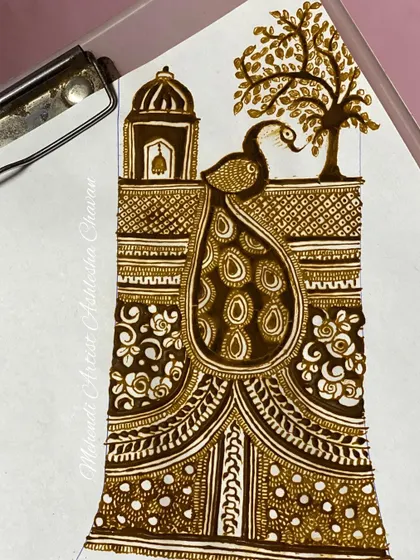 A practice sketch combining a peacock and a temple, two classic motifs in Indian mehendi. This is how I experiment with new compositions.
