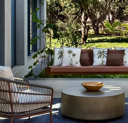A close-up of the outdoor swing on the patio of the Mango Orchard House. It’s the perfect place to relax and enjoy the view of the surrounding mango trees.