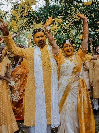 The sheer joy and messiness of a Haldi ceremony. We love capturing the candid reactions as friends and family shower the couple with love and turmeric.