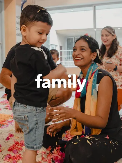 Family is at the heart of our celebrations. A mother and child share a moment of connection during our Holi playdate, surrounded by the beautiful mess of flower petals.