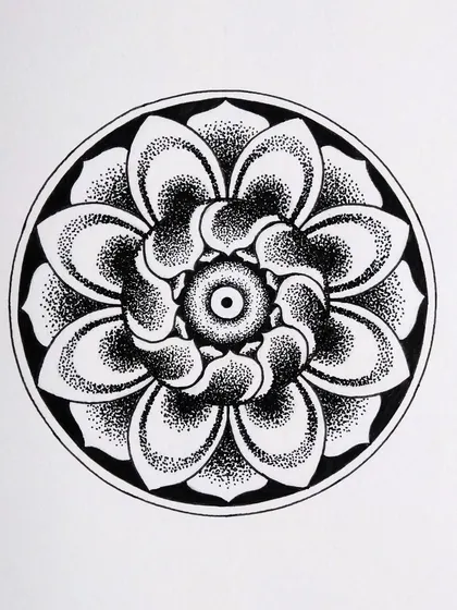 A stippled floral mandala from my Inktober challenge. The shading is achieved entirely by placing tiny dots, a technique that requires patience but creates a beautiful, soft texture.