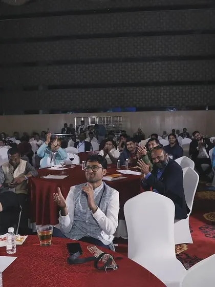 The audience applauding after a successful routine. It's a fantastic feeling to see a room full of people appreciating the show.