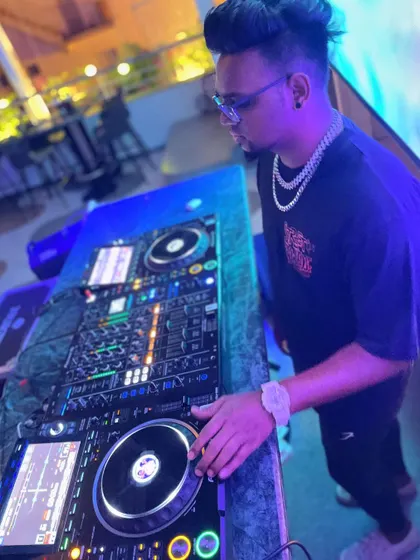A full view of my setup during a set. I work the Pioneer decks to craft a seamless musical journey from start to finish.