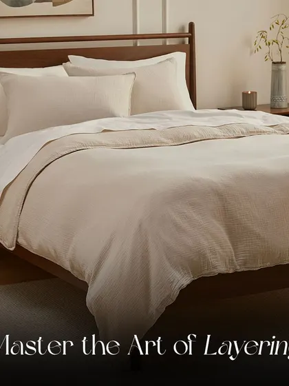 Bed Styling Tip: Master the art of layering. Combining different textures and weights, like a light sheet with a textured duvet and a throw, adds depth and visual interest.