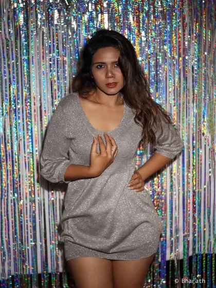 Capturing a dynamic pose against a fun, textured backdrop in the studio. This shows how we can play with different moods in a single session.