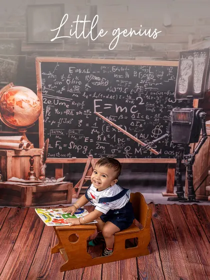 A little genius at his desk. This happy baby is ready to learn his ABCs in our fun and educational "Little Scholar" setup.