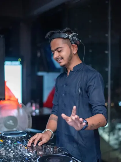Proving myself through my work, not just words. This photo shows me in an ethnic kurta, ready for a themed night, but with the same intense focus on the console.