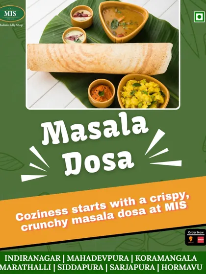 A classic Masala Dosa is the perfect way to end a long day. This image shows it served on a banana leaf with our signature chutneys and sambar, a truly cozy and satisfying meal.