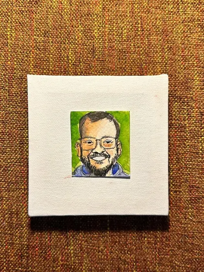 A flat lay of my mini portrait of Chintan.
