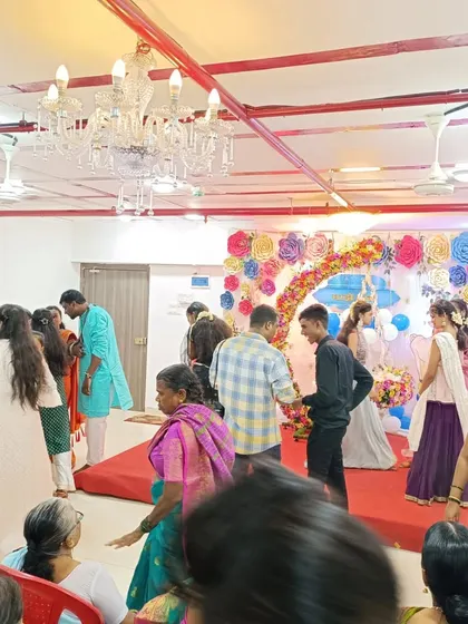 Guests mingling during a 'dohale jevan' ceremony in our Kalyan East hall. The space is versatile enough to host various traditional events.