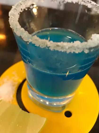 A close-up of our blue shot, a popular choice for parties and high-energy events.