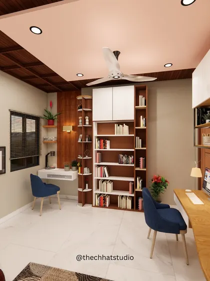 This study space is designed for two, with separate workstations to ensure focus. I included extensive built-in bookshelves for storage and used a mix of wood tones and blue chairs to create a comfortable and organized room.