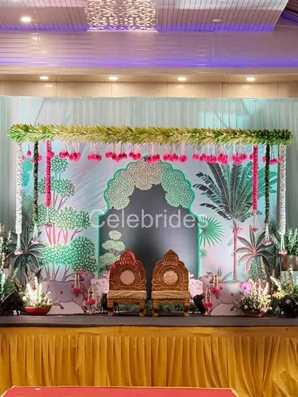 Another beautiful Pichwai-themed engagement stage. The pastel colors and intricate details of the cow and lotus motifs are simply beautiful.