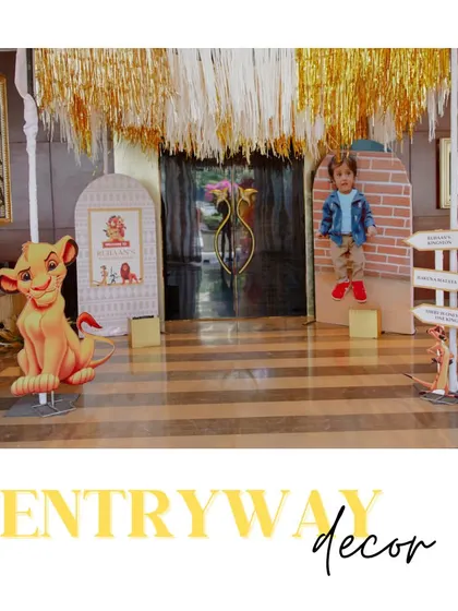 The complete entryway decor for a jungle-themed birthday. With character cutouts and themed signage, the adventure begins the moment guests arrive.