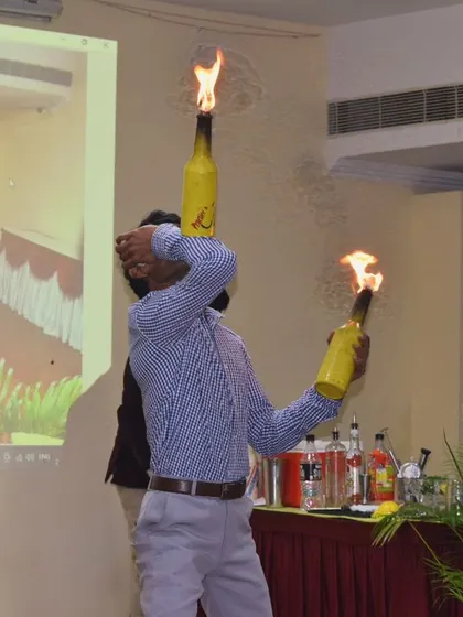 This is what we mean by a flair show. During one of our bartending workshops, we demonstrated how fire juggling can be part of the performance, showcasing the high-level skills and showmanship our team brings to every event.