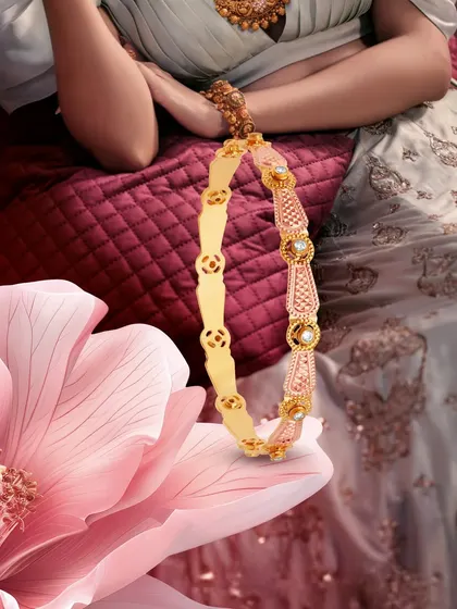 Rose gold warmth and diamond light, this bangle wraps her wrist in a shimmer. A delicate piece for the modern bride.
