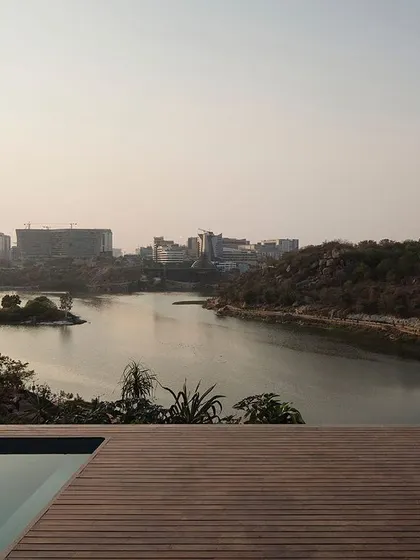 (Duplicate of 55) The infinity pool and deck at the Lakehouse create a perfect vantage point to watch the sunset over the water, blurring the line between the built and natural environment.