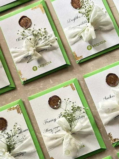 A closer look at the beautiful, classic celebration cards for Sequoia. The green envelopes were hand-addressed in white ink to perfectly match the brand's colors and create a cohesive look.