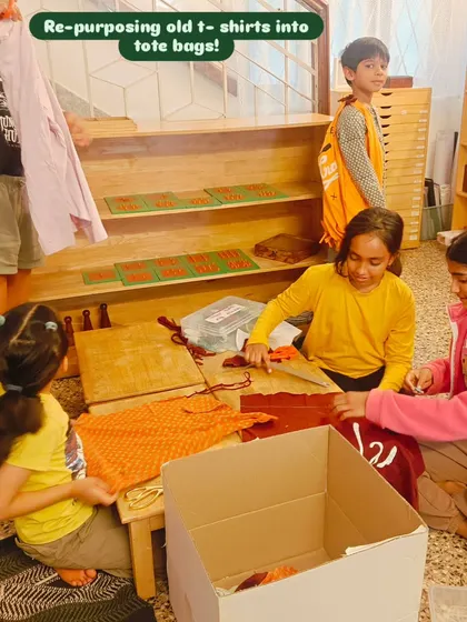 Old t-shirts find new life as tote bags in this hands-on workshop. This activity was part of a fundraiser organized by the children, teaching them about sustainability, resourcefulness, and taking community action.