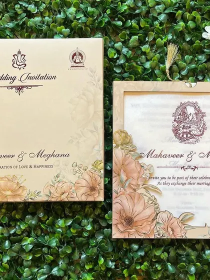 Another view of our pastel floral frame invitation, showing the matching envelope and insert.