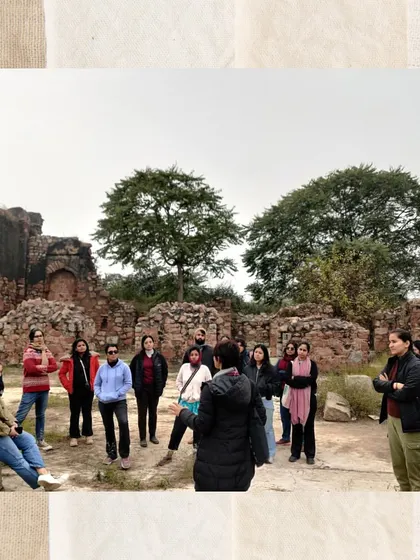 An engaged group listens intently within the palace complex of Tughlaqabad. We explore the series of courtyards, underground granaries, and residential quarters to understand life within the fort.