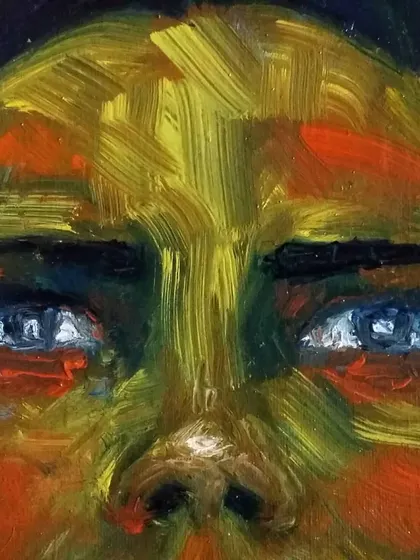 A close-up on the eyes of my first abstract oil portrait, showing the thick, textured brushstrokes and the intense blue of the eyes.