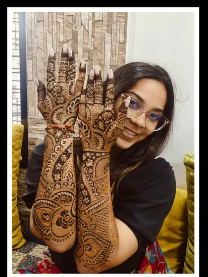Another pose showing the full beauty of the intricate design, perfect for a special family occasion like a brother's wedding.