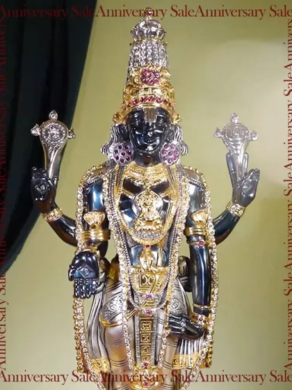 A magnificent Balaji idol, crafted with a dark finish and adorned with silver and gold plated details. This piece combines traditional iconography with a unique artistic vision, creating a powerful spiritual statement.