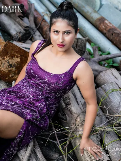 Another angle of the purple sequin gown, showcasing its fit and the way it drapes. This is a perfect example of my custom evening wear.