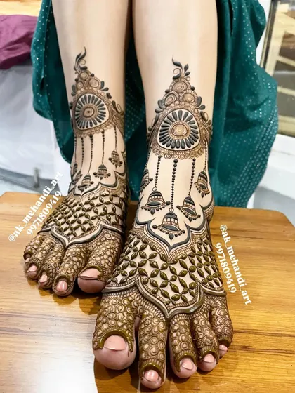 Your feet deserve just as much attention. I design beautiful foot mehndi, like this piece featuring traditional bell 'jhumka' motifs, to complement your bridal look from head to toe.