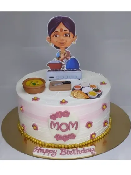 A cake for the best Mom, celebrating her love for cooking. This custom eggless chocolate roasted almond cake features fondant toppers of Indian dishes and a kitchen setup.