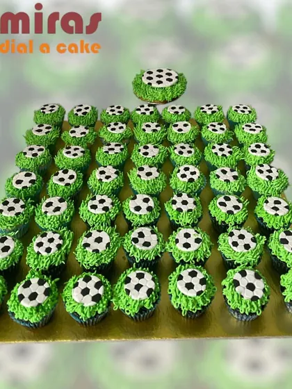 I can cater to any passion, like with this large set of football-themed cupcakes. Each one is topped with green buttercream "grass" and an edible soccer ball, perfect for a sports-lover's birthday party or a game day event.